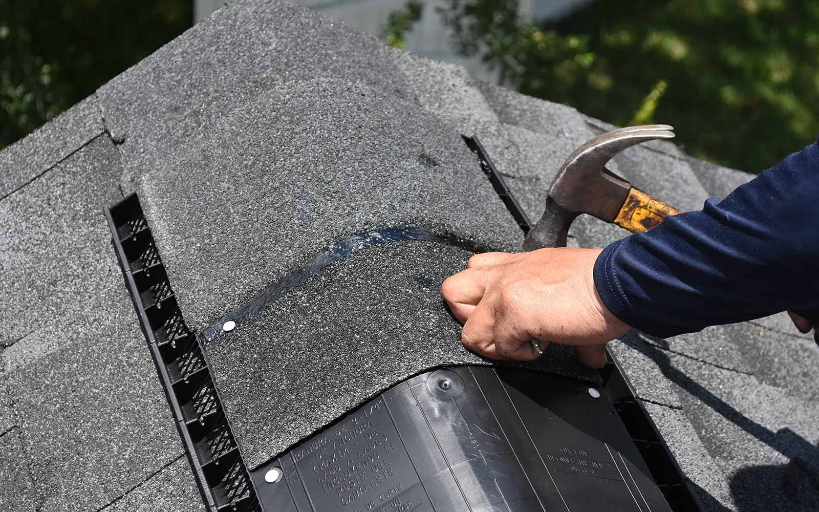 Roof replacement in progress on a residential house